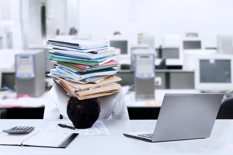 Man buried in paperwork