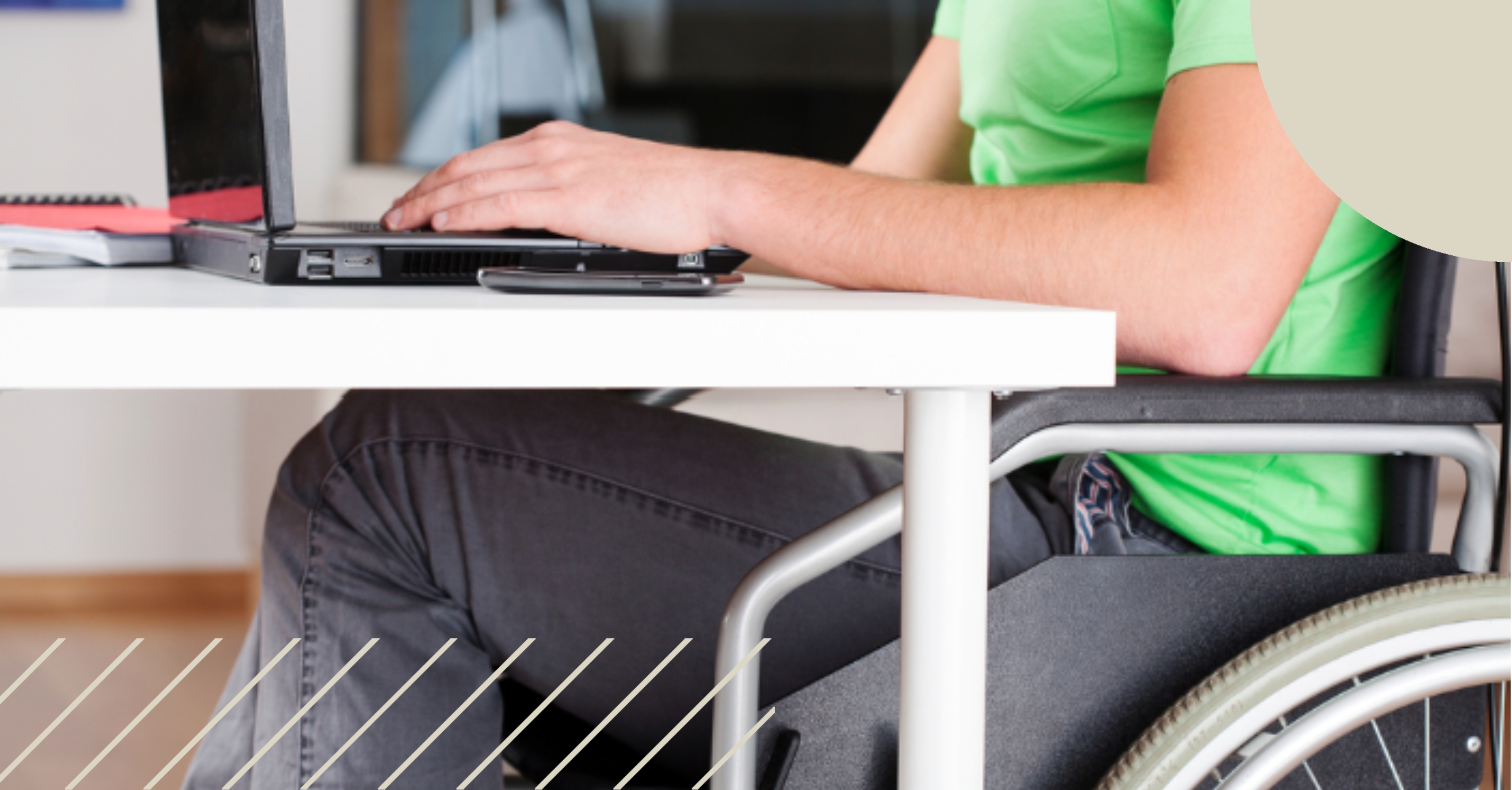 Wheelchair user working at desk